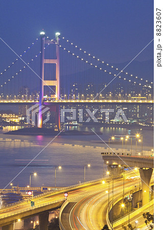 Tsing Ma Bridge in Hong Kong with highway background 8823607