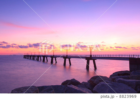 Sunset along the coast with sea stones 8823969