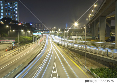 Traffic through downtown of Hong Kong at night 8823970