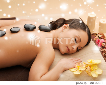beautiful woman with hot stones beautiful woman with hot stones 8836609