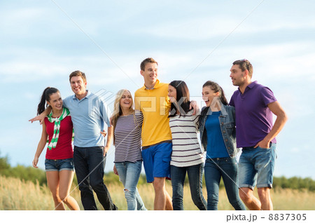 group of friends having fun on the beach group of friends having fun on the beach 8837305