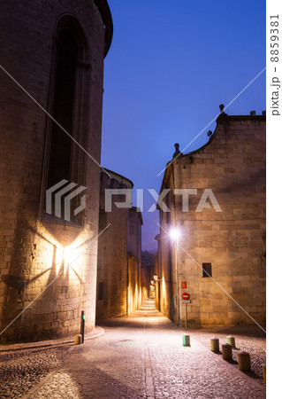 evening Street view of medieval Girona 8859381