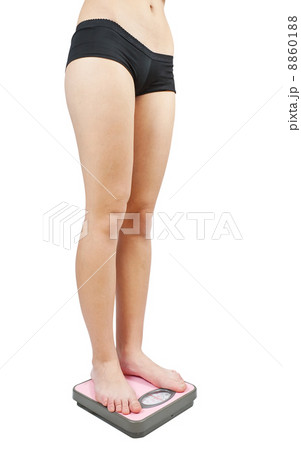 Feet on bathroom scale 8860188