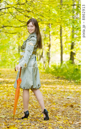 girl with umbrella in autumn 8862913