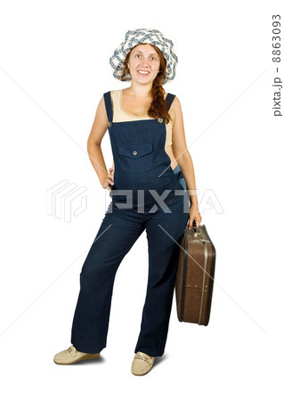 pregnant woman standing with suitcase 8863093