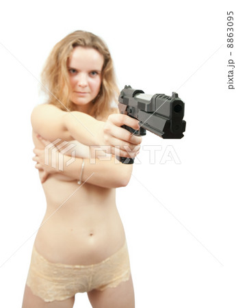 girl aiming gun. Focus on gun only 8863095
