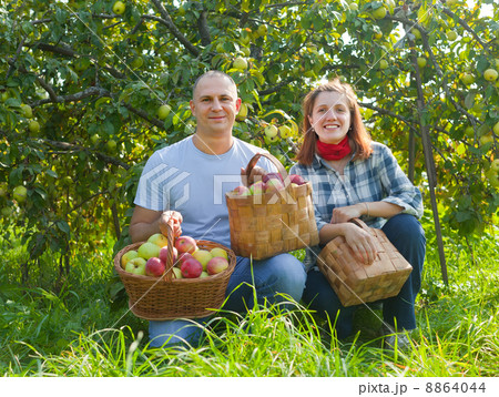 Happy couple in garden Happy couple in garden 8864044