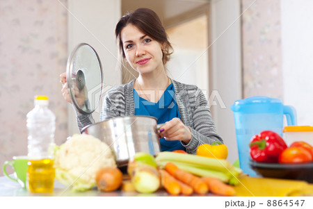 beautiful woman cooking vegetarian lunch 8864547