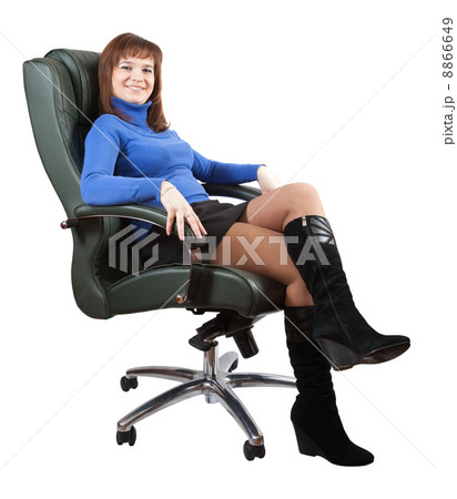 woman sitting on luxury office armchai 8866649