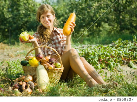 girl with basket of vegetables 8869207
