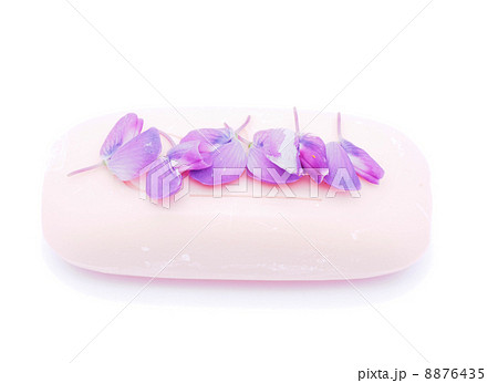 soap and flowers on white background soap and flowers on white background 8876435