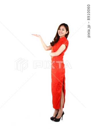 Portrait of young Chinese woman in traditional red Cheongsam presenting, isolated on white background 8910060