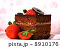 Slice of chocolate cake with strawberries 8910176