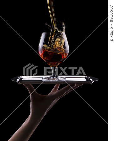 Cognac or brandy on a black 8910507