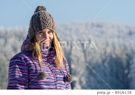 Young woman portrait winter mountains snow Young woman portrait winter mountains snow 8916138