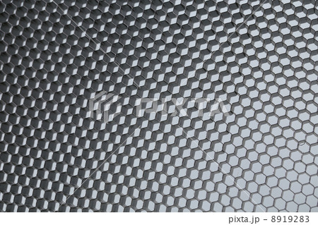 Close up of black net. White light. 8919283