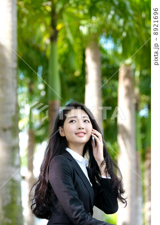 Young Office Lady making phone call 8921696