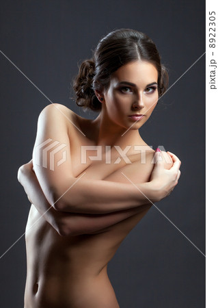 Portrait of hot brunette posing topless in studio Portrait of hot brunette posing topless in studio 8922305