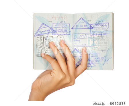 Hand showing passport, close-up shot 8952833