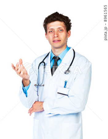 Portrait of a male doctor showing finger at you on white 8961565