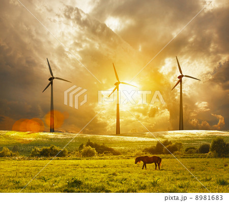 wind turbine at colorful sunset 8981683