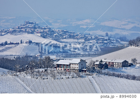 Snowy hills of Piedmont, Italy. 8994030