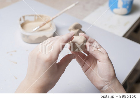 Girl make toyfrom clay Girl make toyfrom clay 8995150