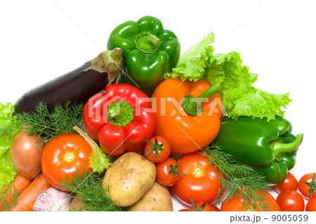 ripe fresh vegetables on a white background closeup ripe fresh vegetables on a white background closeup 9005059