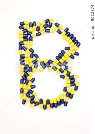 The letter B alphabet made of medical capsules 9012874