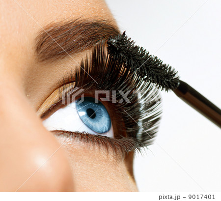 Mascara Applying. Long Lashes closeup 9017401