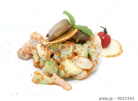 salad, fish and eggs decorated with greens and tomatoes salad, fish and eggs decorated with greens and tomatoes 9022505