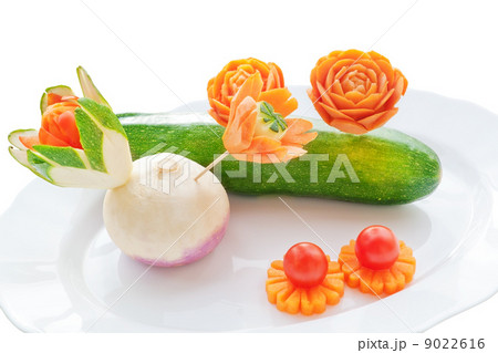 Carving on fresh vegetables. On a white background. Carving on fresh vegetables. On a white background. 9022616