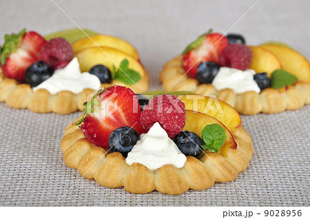 tarts with berries tarts with berries 9028956