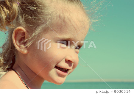 happy little girl on beach happy little girl on beach 9030314