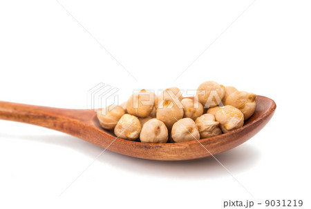 pulses in a wooden spoon isolated pulses in a wooden spoon isolated 9031219