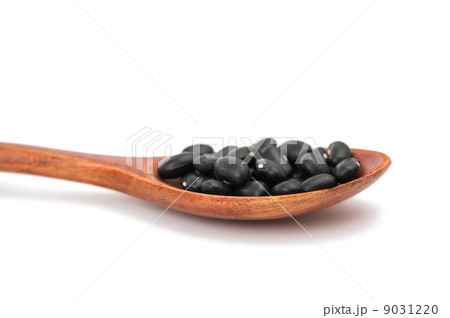 pulses in a wooden spoon isolated pulses in a wooden spoon isolated 9031220