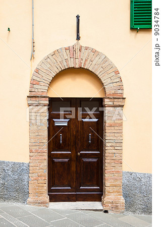 Old elegant door in Italy 9034784