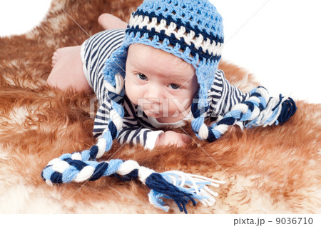 Newborn baby in funny hat Newborn baby in funny hat 9036710