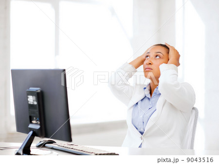 stressed african woman with computer stressed african woman with computer 9043516