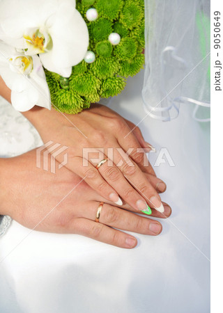 Hands with wedding rings Hands with wedding rings 9050649