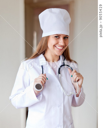 friendly doctor in clinic interior 9055419