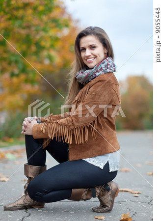 woman at autumn park woman at autumn park 9055448