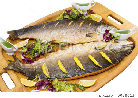 salmon with vegetables on a wooden platter salmon with vegetables on a wooden platter 9058013