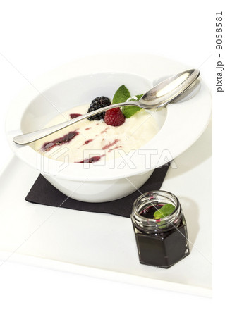 semolina porridge with berries decorated with berry jam 9058581