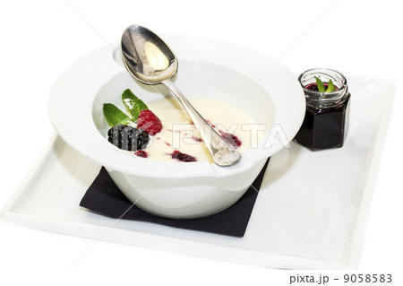 semolina porridge with berries decorated with berry jam 9058583