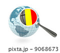 Magnified flag of belgium with blue globe 9068673