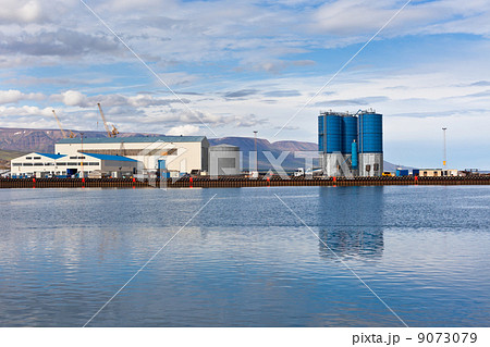 Large tanks and wirehouses at sea commercial dock in North Icela Large tanks and wirehouses at sea commercial dock in North Icela 9073079