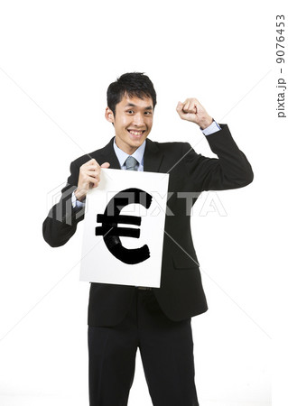 Chinese Businessman holding card sign showing Dollar sign. Chinese Businessman holding card sign showing Dollar sign. 9076453
