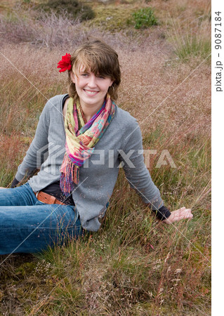 Girl and a red rose 9087184