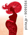 Pregnant woman in flowers 9099364